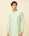 alt message - Manyavar Men Summer Green Embellished Kurta Set image number 0